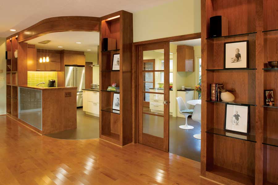 Knocking out two walls allowed the kitchen, breakfast nook and living room to flow together, giving the home an open, unified floor plan. Now Kathy can socialize while cooking.